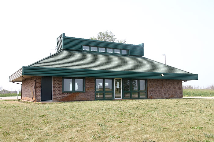 The Pipestone Hills Golf Club has purchased this building, the former Tourism Saskatchewan visitor reception centre at the Manitoba border, and plans to move it to the golf course this fall to serve as a new clubhouse.